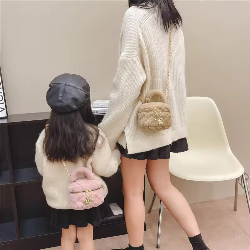 Soft Furr Handbags with charm π